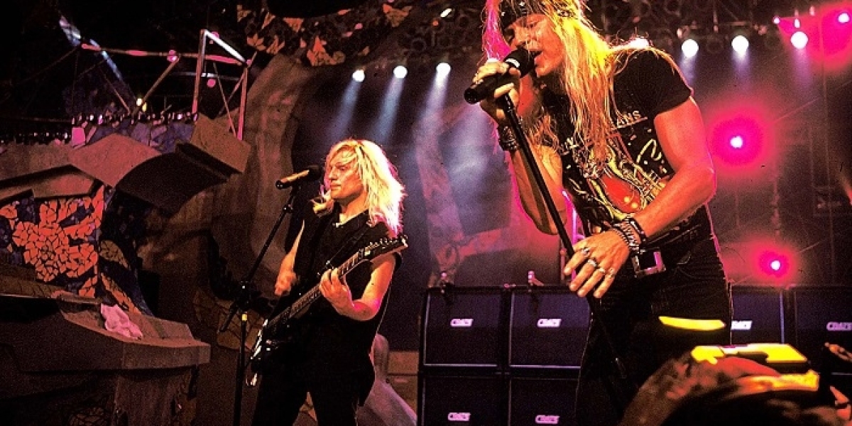 What Themes Dominate Glam Metal Lyrics?
