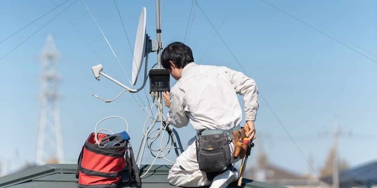Satellite technicians in Sabah Al-Ahmad